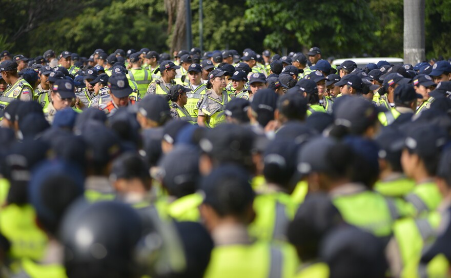 Venezuelan police gather ahead of the opposition march in Caracas.
