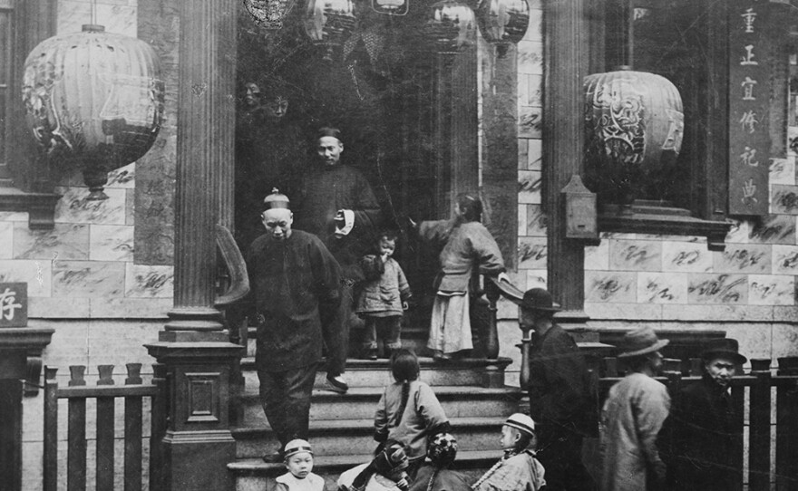 In front of the Joss House, Chinatown, San Francisco. (undated photo)
