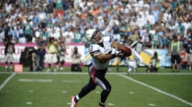 San Diego Chargers wide receiver Vincent Jackson makes a touchdown catch during the first quarter of an NFL football game against the Miami Dolphins Sunday, Oct. 2, 2011, in San Diego.