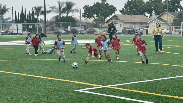 Students at King Chavez Primary Academy enjoy the new Stockton neighborhood joint-use soccer field, San Diego, Calif., Oct. 4, 2022. 