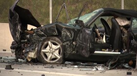 The wreckage of a fatal crash on the HOV off-ramp from southbound Interstate 15 at Del Lago Boulevard on Sept. 2, 2019.
