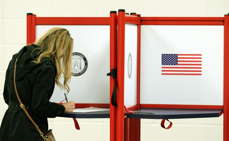 A voter casts a ballot in Louisville, Ky., this month. Long-serving election officials around the country are retiring ahead of the 2020 election, which could be among the most challenging to administer in the country's history.