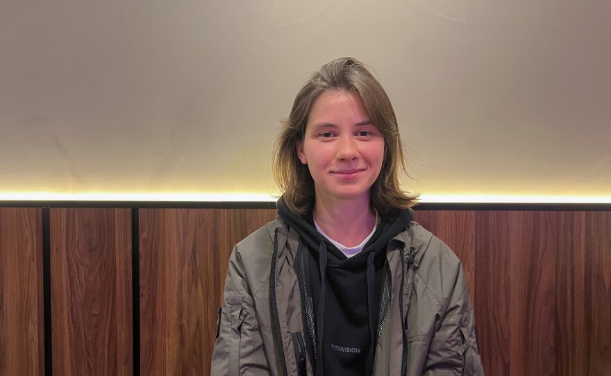 Maryna Mytsiuk, a 27-year-old Ukrainian folklore scholar, meets NPR at a cafe in Kyiv, Ukraine. She has been prepping for the day she hopes she'll get called up for combat.