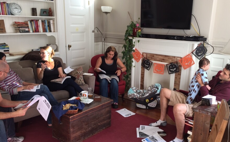 Deborah Barron, third from left, hosts a proposition party on Oct. 30 at her home in San Francisco's Mission District.