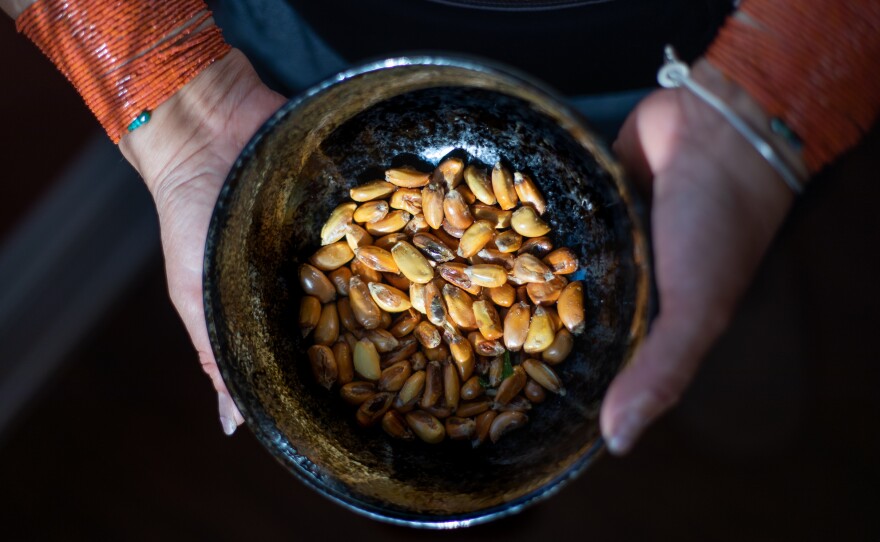 Eli Farinango is an award-winning Kichwa artist and photographer who was born in Quito, Ecuador, and raised in Ottawa, Canada. In the photo above, Virginia Anrango holds tostado she made for her daughters. "The tostado is a traditional food from Ecuador. With its simple preparation, its kernels transmit the memory of our ancestry no matter where we are," says Farinango.