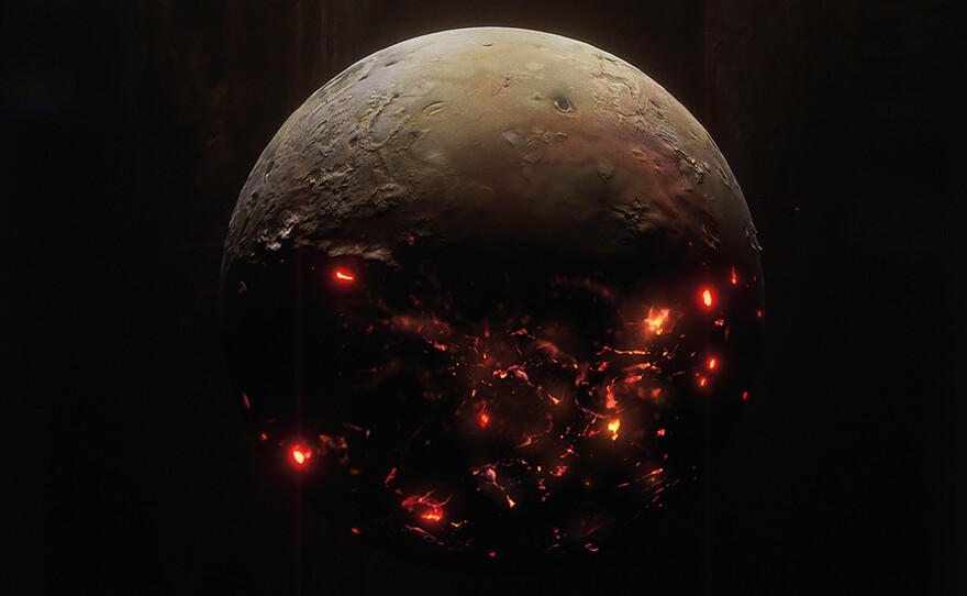 Lava pools glowing on the night side of Jupiter's moon, Io, the most volcanic world in our solar system.