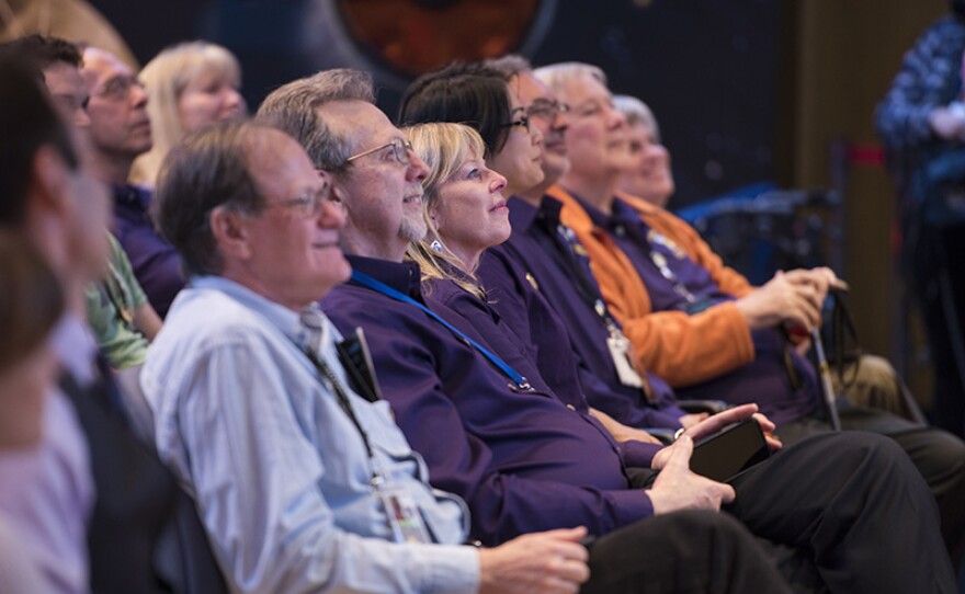 Team members and guests at JPL awaiting news about the Cassini dive through Saturn's rings.