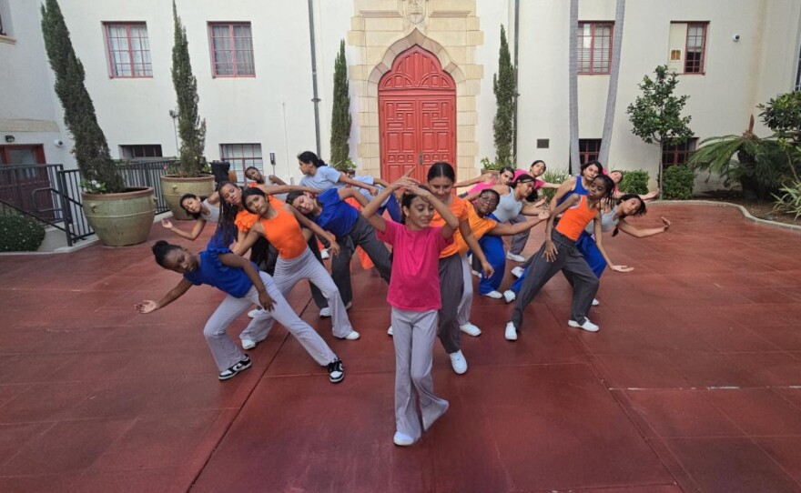 Youth dancers rehearse in front of St. Paul's Cathedral for transcenDANCE's "Illuminate" performances, shown in an undated photo.