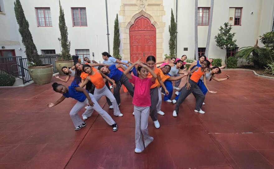 Youth dancers rehearse in front of St. Paul's Cathedral for transcenDANCE's "Illuminate" performances, shown in an undated photo. 