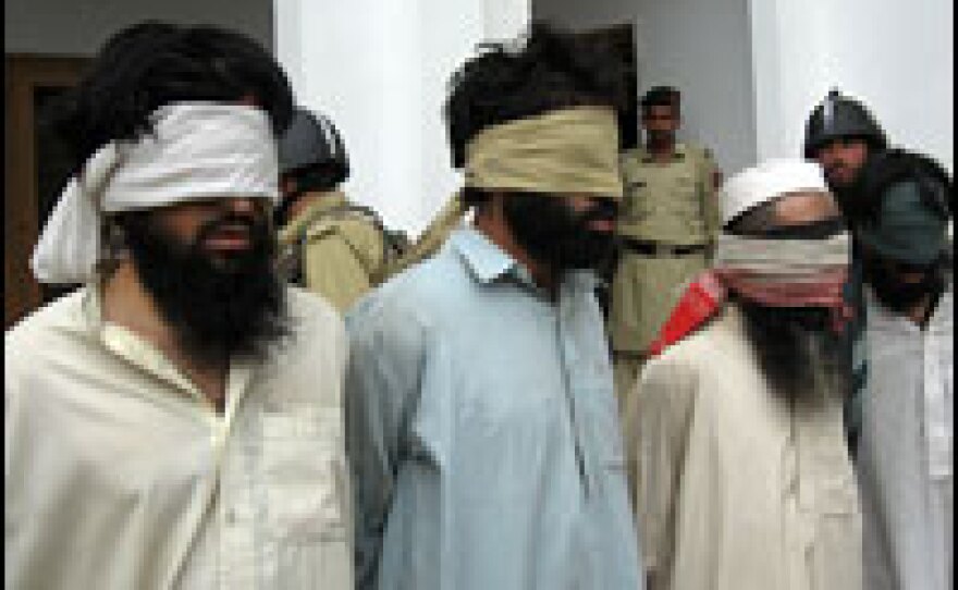 Security forces seize suspected Taliban militants in Lower Dir. The Pakistani army launched the offensive eight weeks ago.