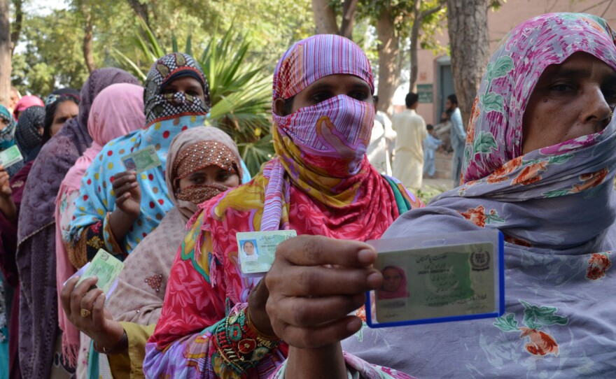 Pakistani women queue to cast their ballots last month at a polling station during local government elections in Lahore, one of the country's biggest cities. In other areas, local tradition can prevent women from voting.