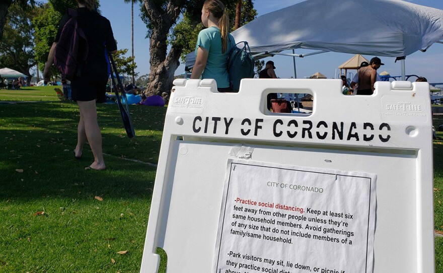 A sign enforcing social distancing at a park in Coronado, July 17, 2020