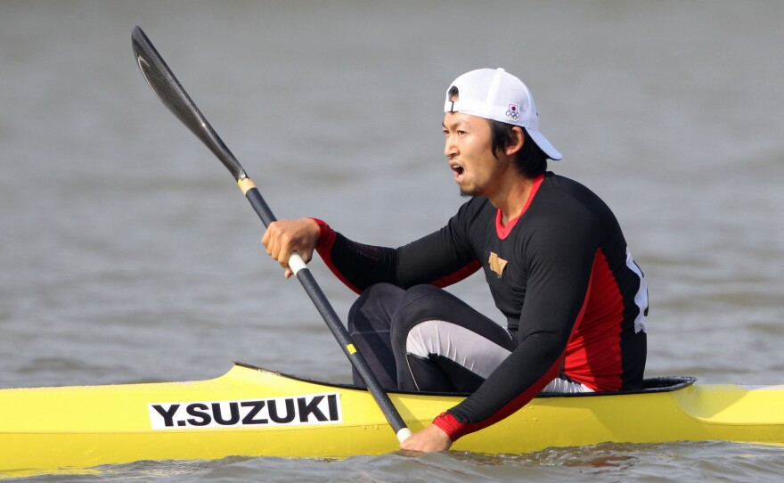 Yasuhiro Suzuki of Japan reacts after competing in the Canoe Sprint Men's Kayak Single 1000m during the Guangzhou Asian Games on Nov. 25, 2010, in Guangzhou, China. Suzuki is now banned for eight years for spiking a fellow Japanese racer's drink with an anabolic steroid.