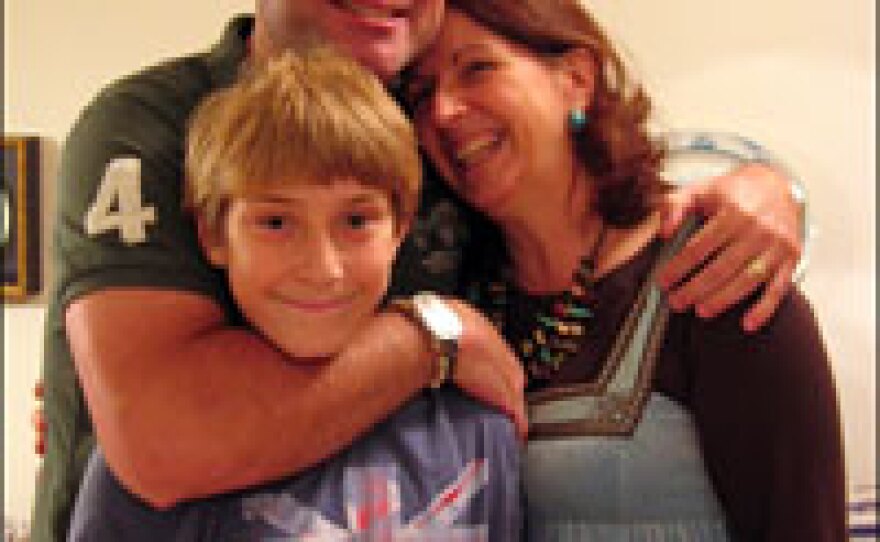 Fenton with his wife, Christine, and his son, Connor, at home in Virginia.