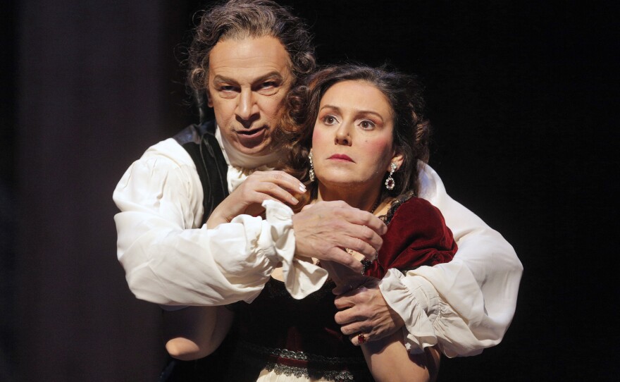Bass-baritone Greer Grimsley is Scarpia and soprano Alexia Voulgaridou is Tosca in the new San Diego Opera production of Puccini's "Tosca."