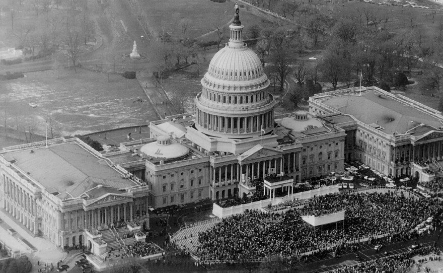 A crowd gathers outside the U.S. Capitol for Dwight D. Eisenhower's second presidential inauguration, in 1957. Ten other men have held the office during Dingell's time in Congress.