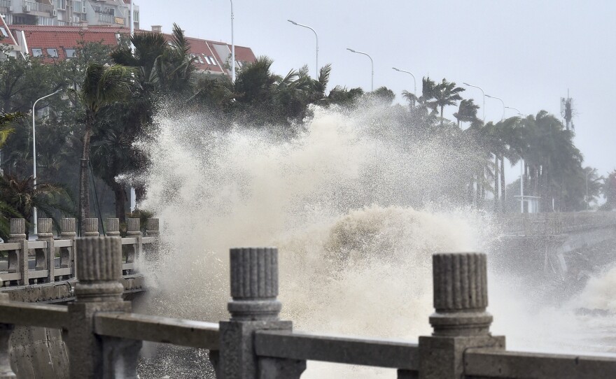 In the grips of Typhoon Mangkhut on Sunday, waves crashed against the coastline in Zhuhai, southern China's Guangdong province. The storm has torn through the Philippines, Hong Kong and Macau.