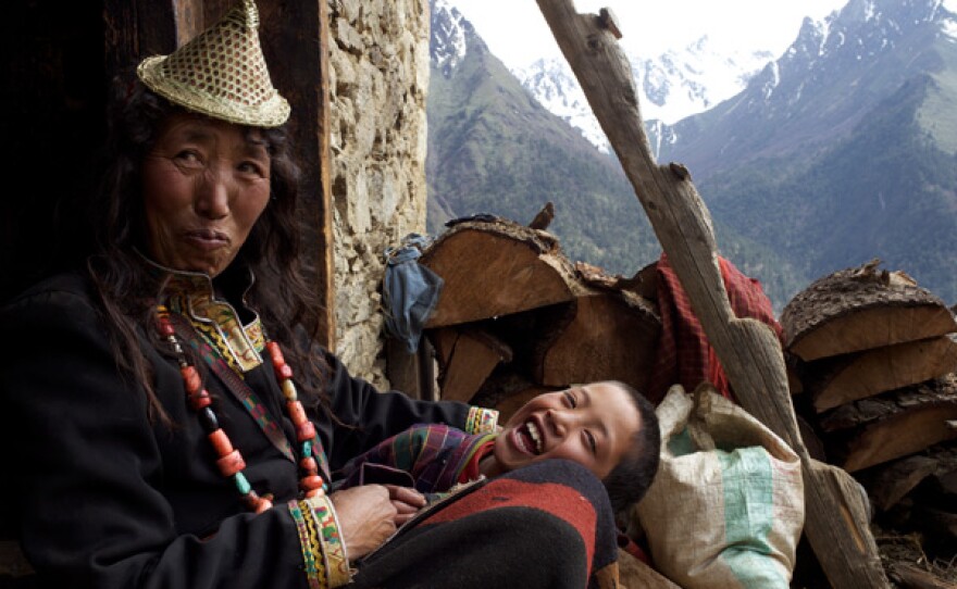 Little monk Peyangki (right) and his mother at their home in Laya in the Himalaya, Bhutan.