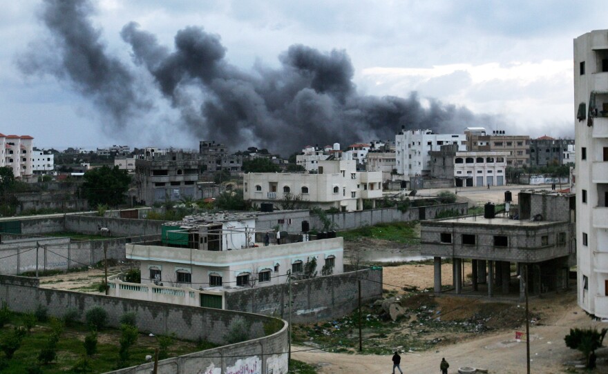 Smoke billows from a mosque following an Israeli air raid Dec. 31, 2008, in Gaza City.
