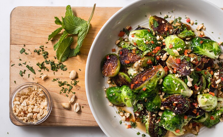 Skillet roasted Brussels sprouts with chile, peanuts and mint