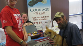 Student Kristee Novak with Vietnam veteran Richard Jones and his dog Katie at the "Homeless Connect" event in Cal State San Marcos Nov 16th 2011