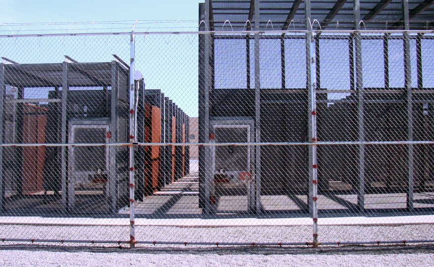 Inmates in solitary confinement in New Mexico State Penitentiary are allowed one hour a day outside, in these individual cages. Each inmate has to strip all the way down in a cage inside before and after his hour of recreation.