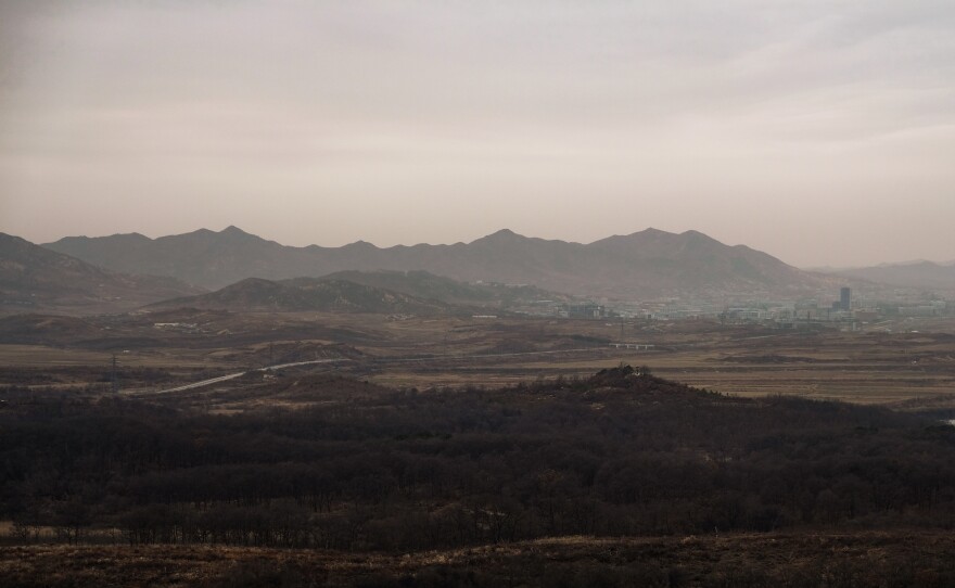 The view from the Dorasan observatory, looking into North Korea, with the city of Kaesong and its joint industrial zone in the distance.