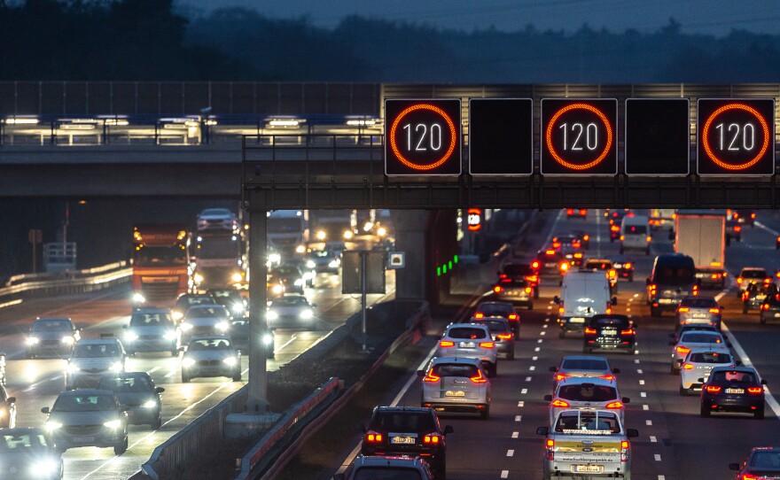 Cars drive near Frankfurt Airport on Tuesday in Germany. Most German highways have no speed limit, and a proposal to cap speeds at about 80 mph has sparked controversy.