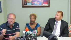 From left, Kevin Huckabee, who for two years fought for  the release of his American son from a Mexican prison; Althea Smith, mother of Jabin Bogan the American trucker detained in Mexico; and Carlos Spector, attorney for Bogan's family, at a press conference held at Spector's office. 