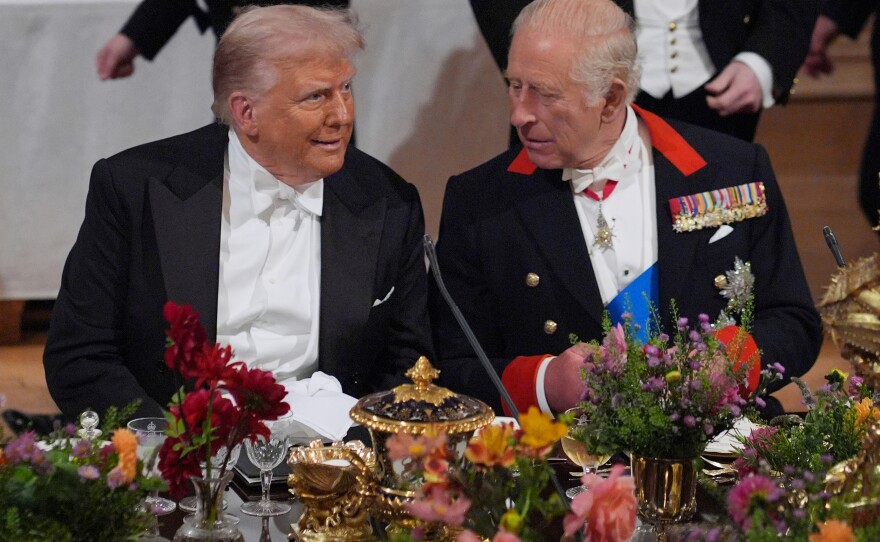 Britain's King Charles, right, and U.S. President Donald Trump speak at a State Banquet in Windsor Castle, England, on day one of U.S. President Donald Trump and First Lady Melania Trump's second state visit to the UK,  Sept. 17, 2025.