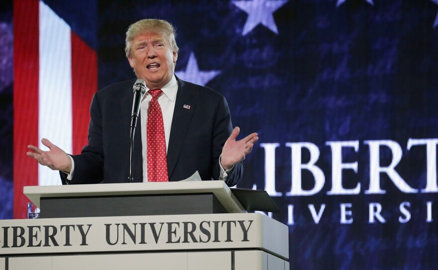 Donald Trump delivers the convocation Liberty University Monday. The flamboyant, twice-divorced billionaire has never been an easy fit with the religious right.