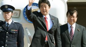 Japan's Prime Minister Shinzo Abe leaves Tokyo's Haneda airport Sunday for the Netherlands to attend the Nuclear Security Summit in The Hague.
