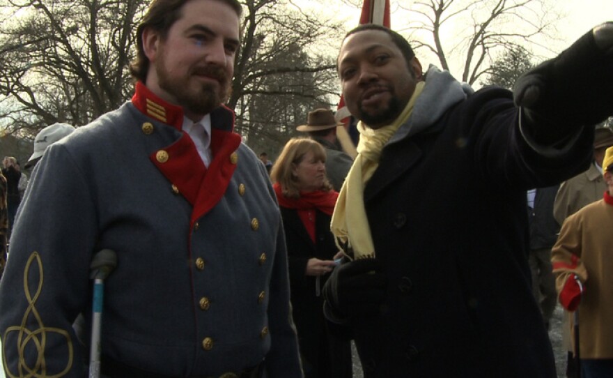 Director Shukree Tilghman with Brandon Dorsey, of the Sons of Confederate Veterans.