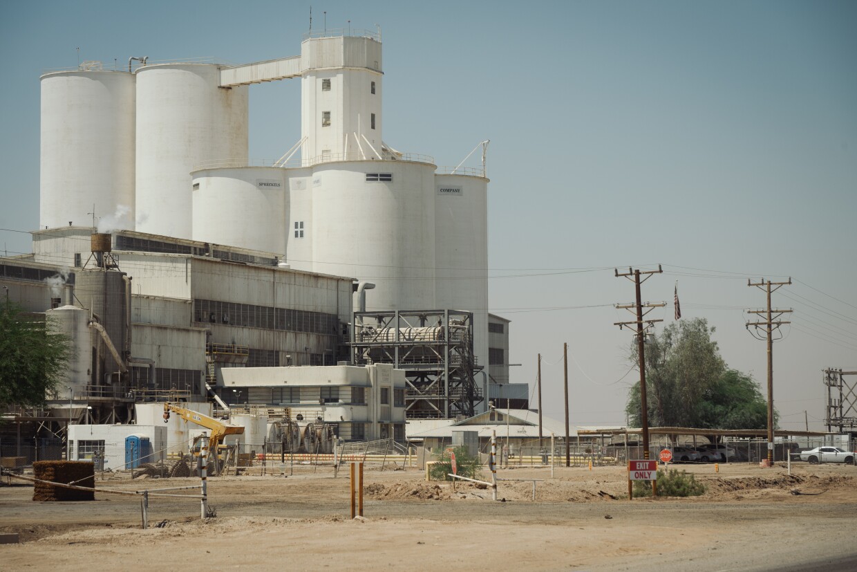 The Spreckels Sugar factory towers over the roads south of Brawley, California in the Imperial Valley on August 5, 2025. The factory’s last season of processing sugar beets in the valley is underway as the facility’s owner, Southern Minnesota Beet Sugar Cooperative, prepares to wind down operations.