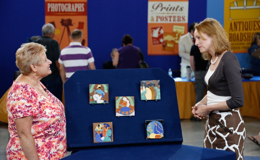 Suzanne Perrault (right) appraises San Jose pottery tiles, ca. 1930 for $2,700 to $3,500 in Baton Rouge, Louisiana.