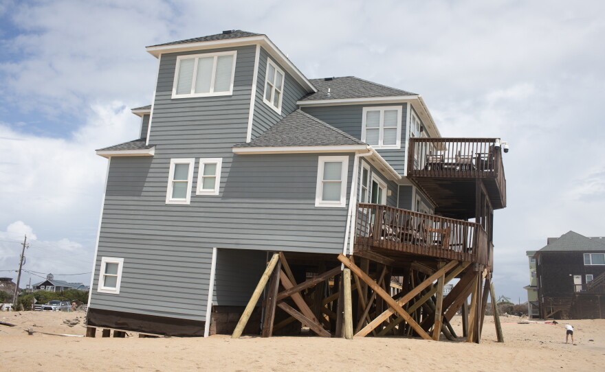 Extra sand has bought extra time for the owners of homes damaged by waves in recent years in Dare County, but the long-term problem of beach erosion persists.