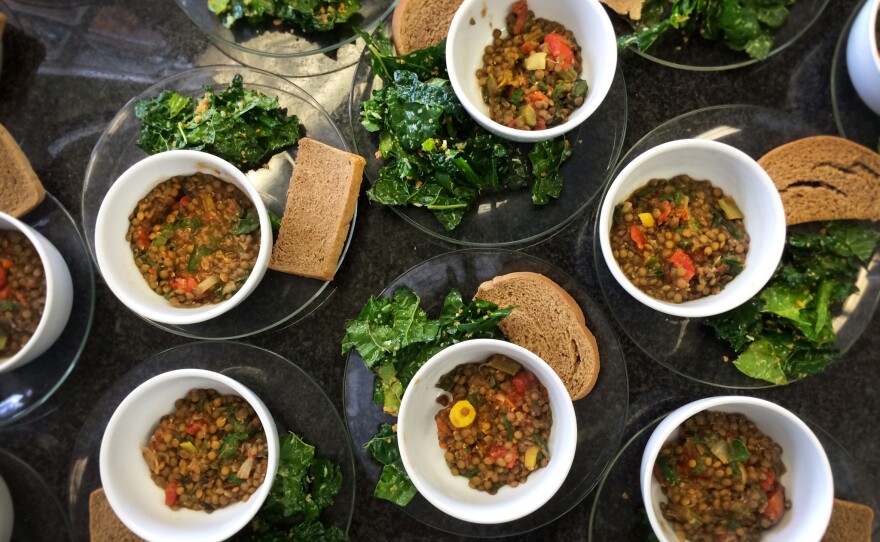 Soup's on! Tuscan kale salad, lentil soup with spinach, and toast with garlic herb butter.