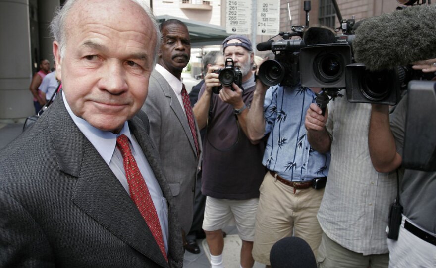 Former Enron CEO Kenneth Lay stands outside the U.S. courthouse in Houston after the close of his bank fraud trial in May 2006. Two Stanford University researchers say that lying CEOs tend to use a lot of words that express positive emotion to overcompensate.