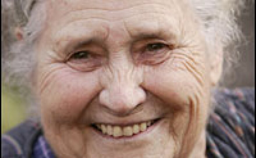 The Nobel Prize judges said that "with skepticism, fire and visionary power," Lessing "subjected a divided civilization to scrutiny." Above, Lessing addresses the media outside her home in north London on Thursday.