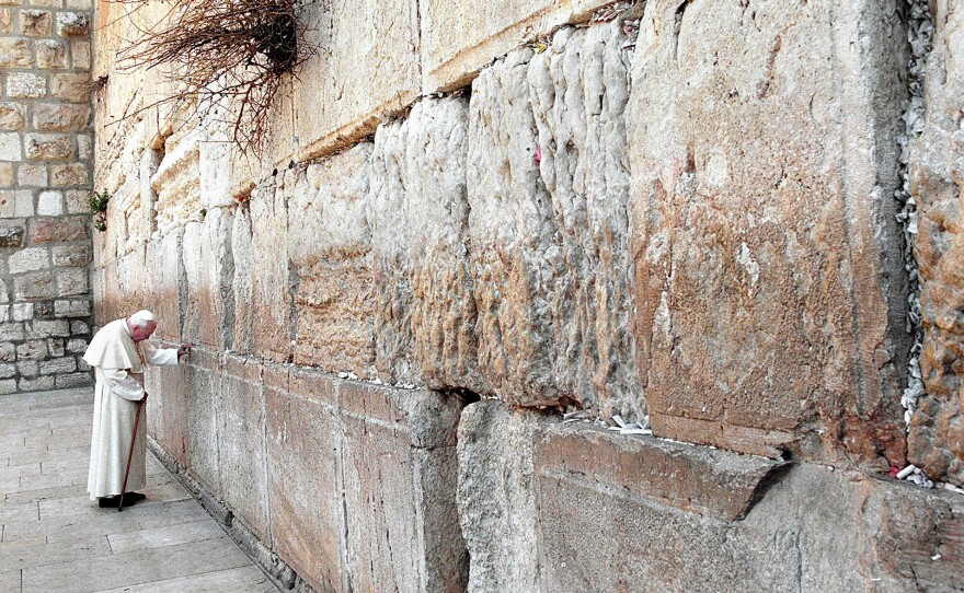 Pope John Paul II visits the Western Wall on a trip to Jerusalem in 2000.