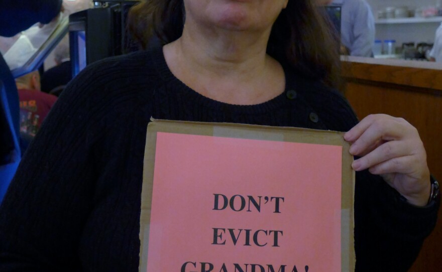 "Lunch mobber" Barbara Nassberg protests the planned closure of the Café Edison to make way for a more upscale restaurant.