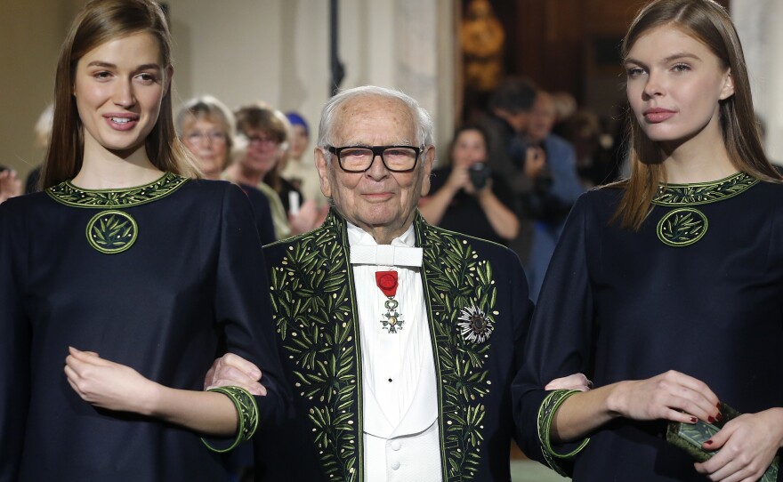 French designer Pierre Cardin has died at age 98. Here, the member of the Academie des Beaux-Arts is seen in 2016, at the end of a fashion show marking 70 years of his creations at the Institut de France in Paris.