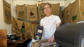 Omid Ghamami, a micro coffee roaster in Carlsbad, poses for a portrait inside his residential coffee roasting facility on March 13, 2026.