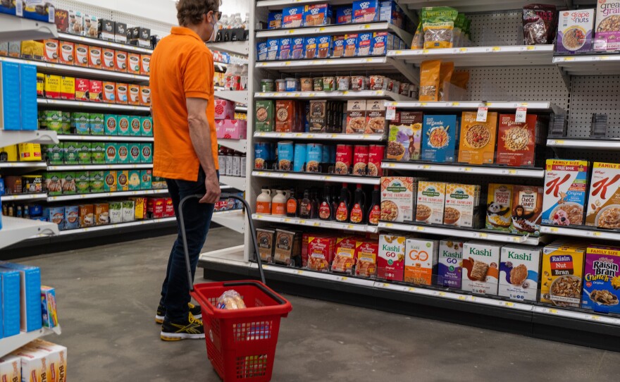 People shop at a grocery store in New York City on June 10. Annual inflation hit its highest rate in over 40 years, raising the likelihood of an aggressive response from the Federal Reserve.