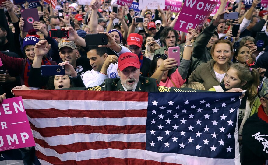 Donald Trump supporters cheer for him during a Nov. 4 campaign rally in Hershey, Pa.