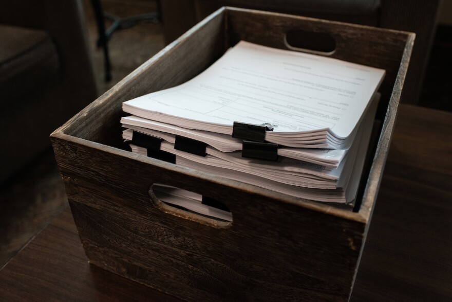 A box of past temporary restraining orders from the court waiting to be picked up by clients at the Sacramento Regional Family Justice Center in Sacramento on Nov. 1, 2021. The center provides support for survivors of domestic violence and elder abuse.