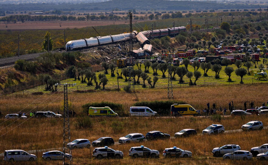 Emergency services work at the scene of a collision between two trains in Urda, Spain, on Wednesday, Oct. 28, 2026.