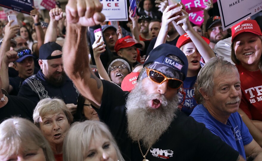 Supporters cheer for Donald Trump at a campaign rally in in Tampa, Fla., Saturday.
