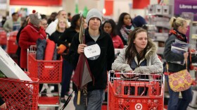 People shop at a Target on Thanksgiving night November 22, 2012 in Highland, Indiana. 