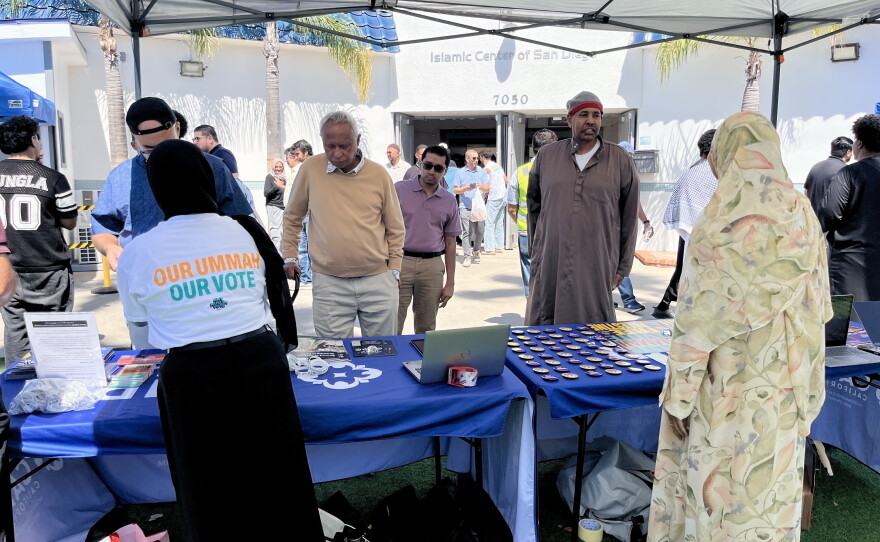 People gather at voter registration tables outside of Islamic Center of San Diego, Sept. 18, 2026.